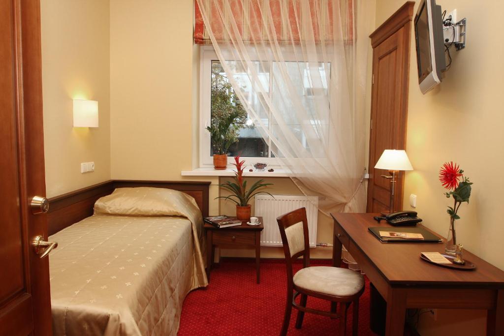 Hotel Conviva Panevėžys Pokoj fotografie
