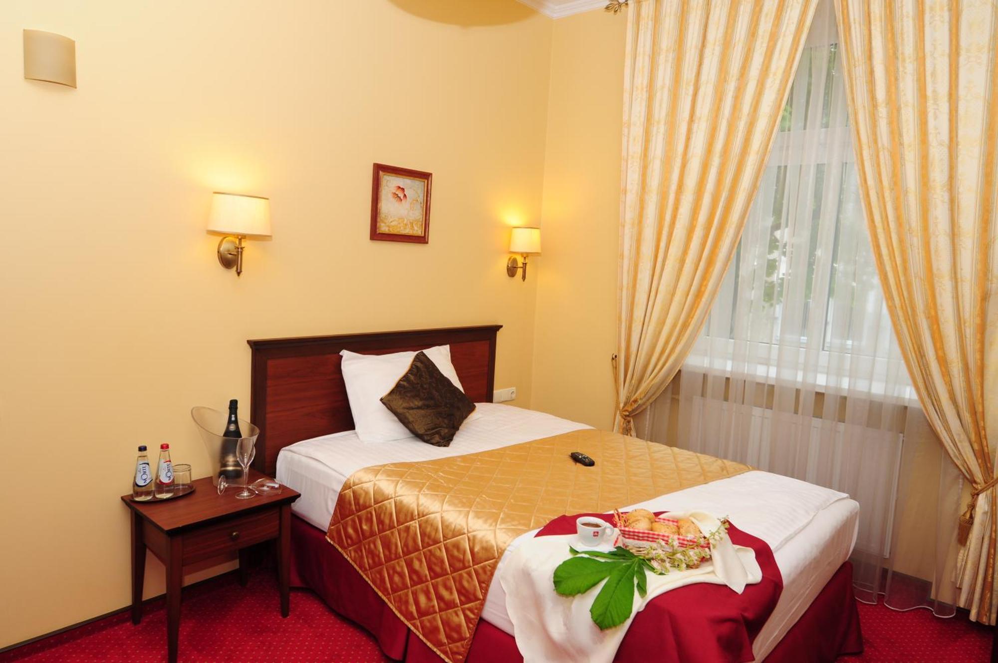 Hotel Conviva Panevėžys Pokoj fotografie