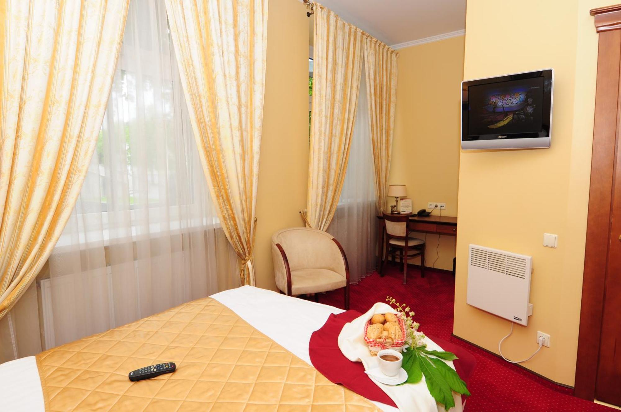 Hotel Conviva Panevėžys Pokoj fotografie