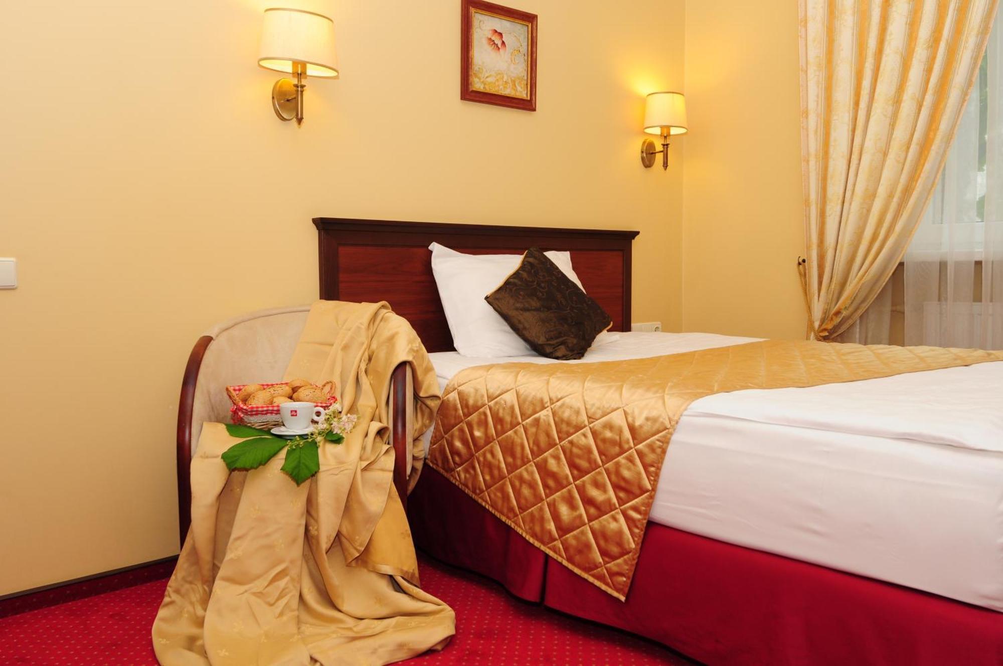 Hotel Conviva Panevėžys Pokoj fotografie