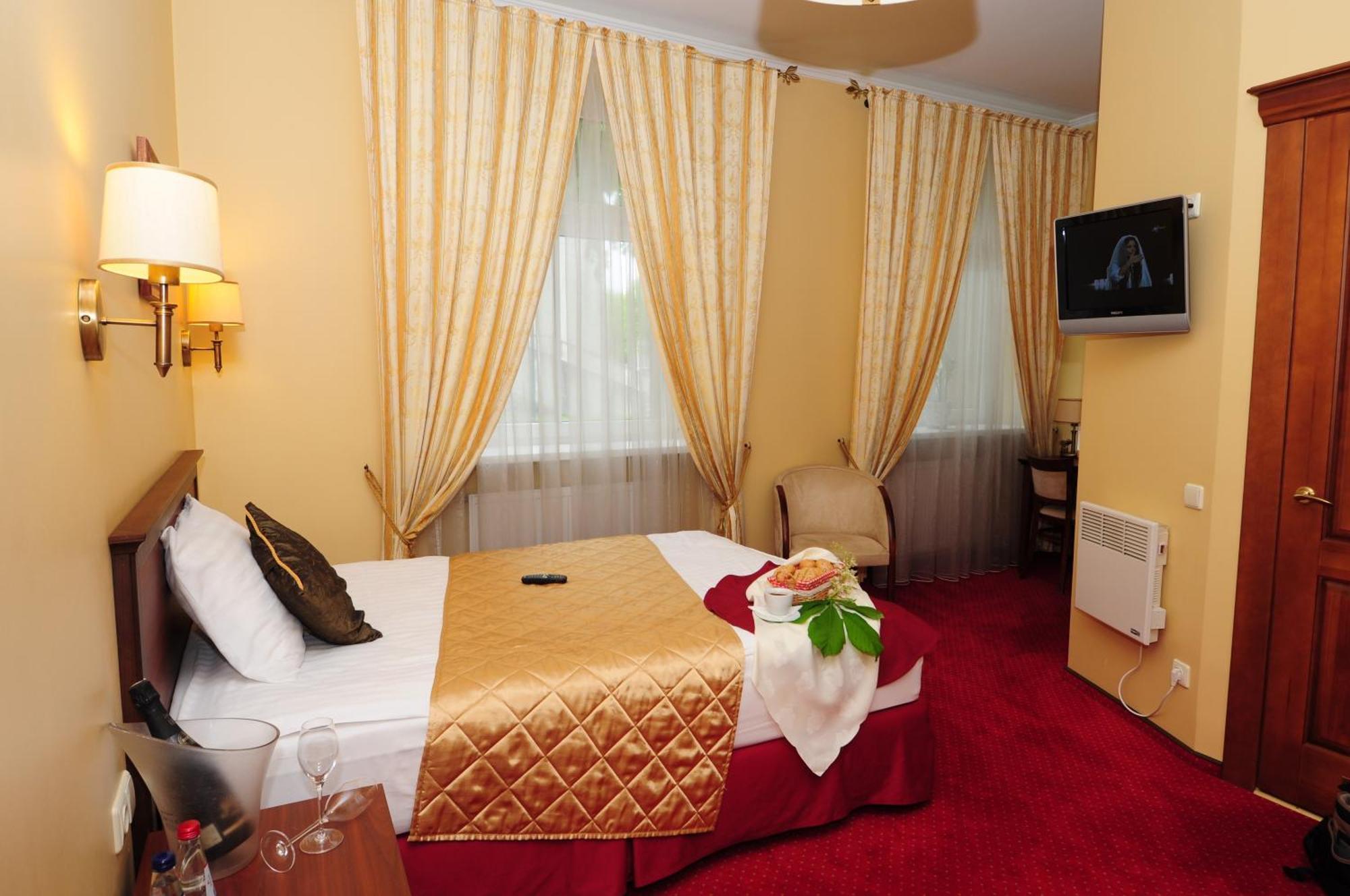 Hotel Conviva Panevėžys Pokoj fotografie