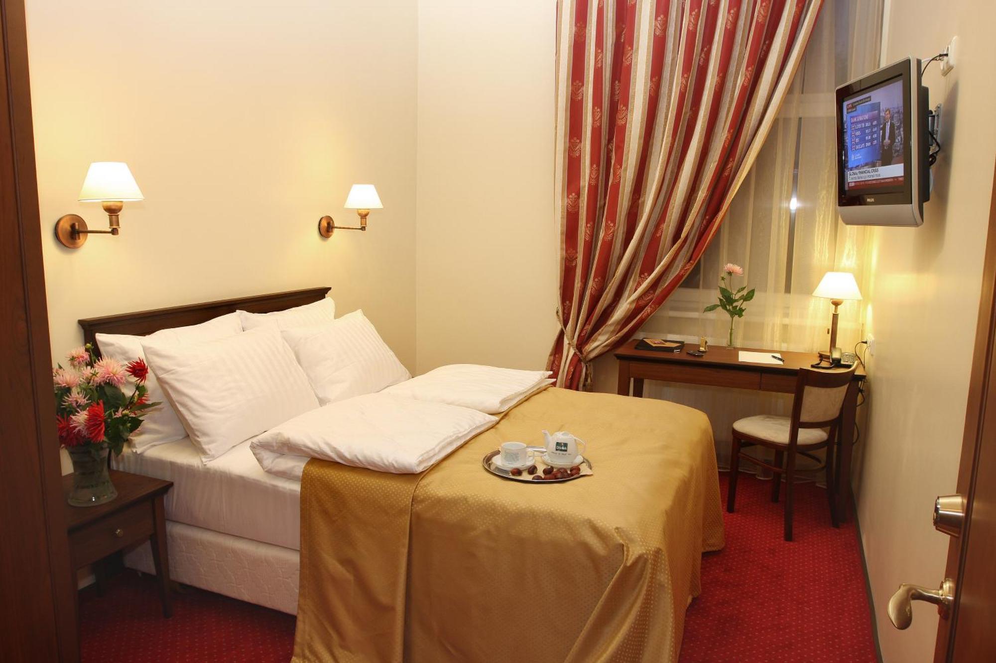 Hotel Conviva Panevėžys Pokoj fotografie